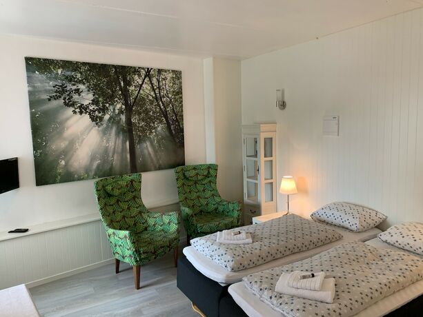 Imagen de la habitación del Hotel Sj&oslash;bergl og Ferieleiligheter. Foto 19