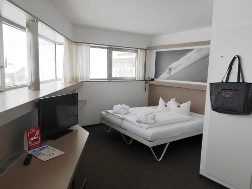 Imagen de la habitación del Hotel Ski Austria St.Christoph a.A.. Foto 20
