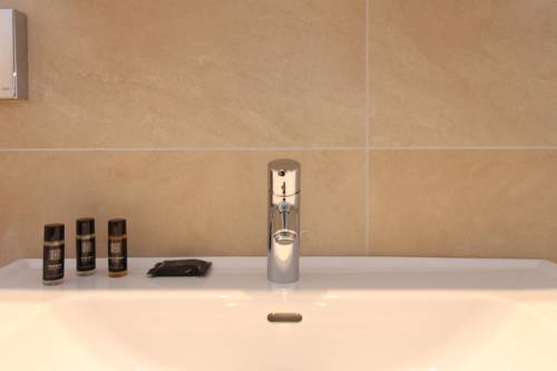 Imagen de la habitación del Hotel Ski & Golf Suites Zell Am See By Alpin Rentals. Foto 14