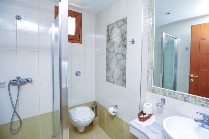 Imagen de la habitación del Hotel Skiathos Island Suites. Foto 6