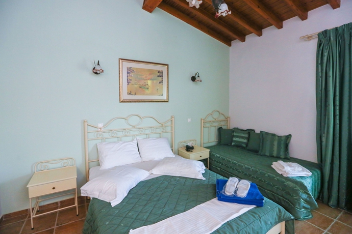 Imagen de la habitación del Hotel Skiathos Island Suites. Foto 7