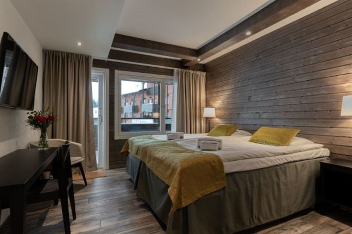 Imagen de la habitación del Hotel Ski-inn Rukavalley. Foto 8
