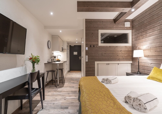 Imagen de la habitación del Hotel Ski-inn Rukavalley. Foto 14
