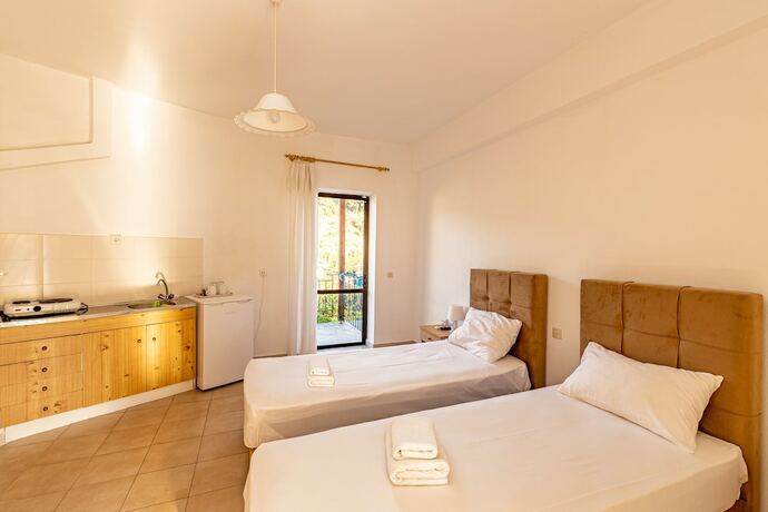 Imagen de la habitación del Hotel Skioni Studios. Foto 13