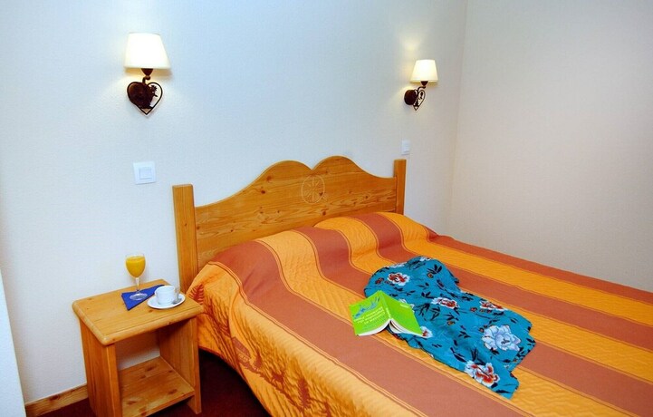 Imagen de la habitación del Hotel Skissim Select - R&eacute;sidence Les Alpages Du Corbier. Foto 6