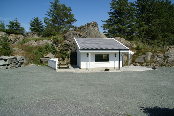 Imagen de la habitación del Hotel Skudenes Camping. Foto 18