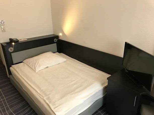 Imagen de la habitación del Hotel Sky Business. Foto 7