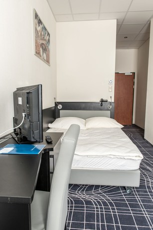 Imagen de la habitación del Hotel Sky Business. Foto 14