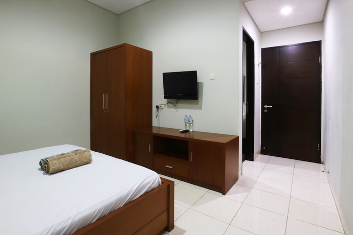 Imagen de la habitación del Hotel Sky City Home. Foto 4