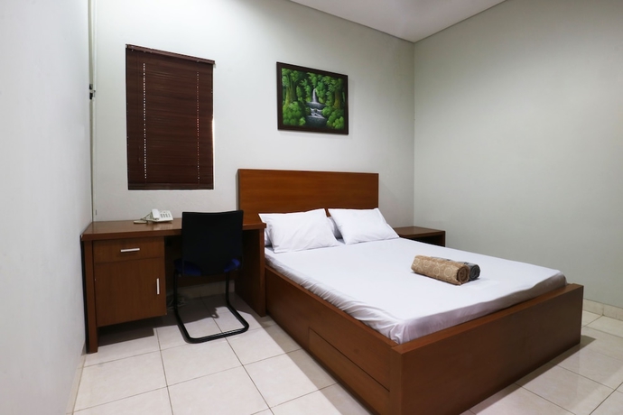 Imagen de la habitación del Hotel Sky City Home. Foto 5