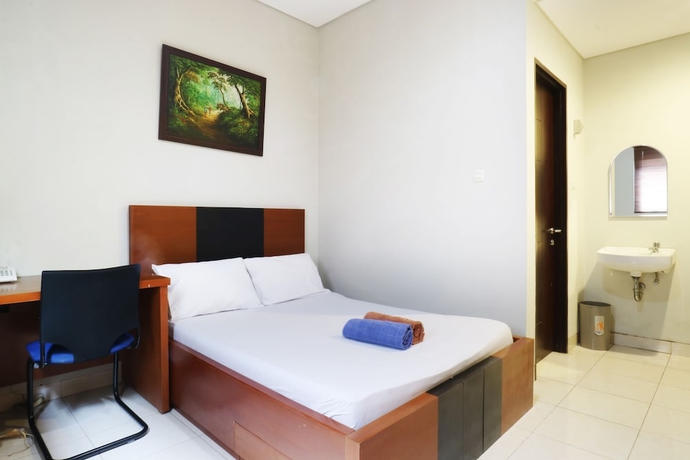 Imagen de la habitación del Hotel Sky City Home. Foto 6