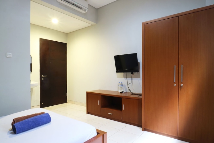 Imagen de la habitación del Hotel Sky City Home. Foto 7