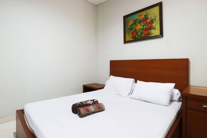 Imagen de la habitación del Hotel Sky City Home. Foto 8