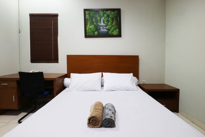 Imagen de la habitación del Hotel Sky City Home. Foto 9