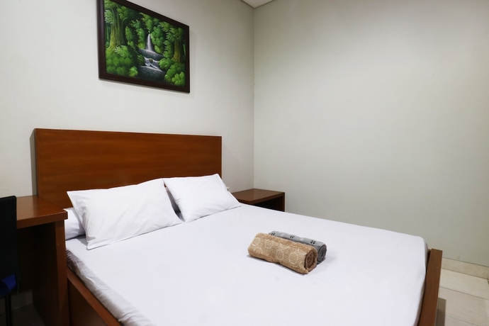 Imagen de la habitación del Hotel Sky City Home. Foto 10