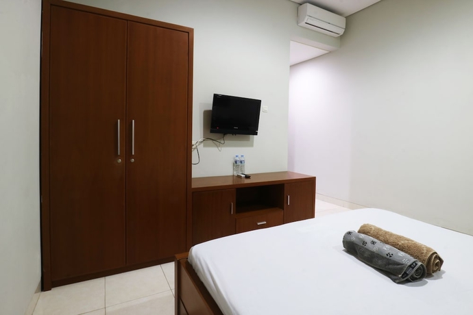 Imagen de la habitación del Hotel Sky City Home. Foto 11