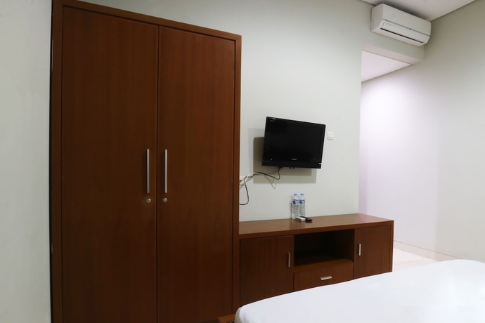 Imagen de la habitación del Hotel Sky City Home. Foto 12