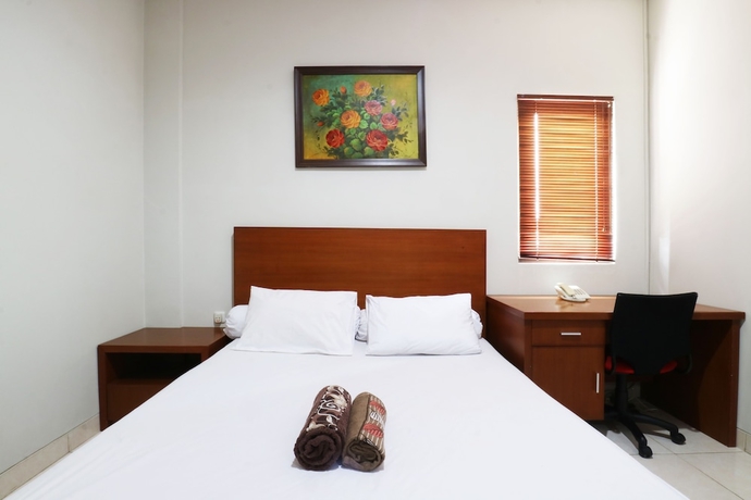 Imagen de la habitación del Hotel Sky City Home. Foto 13