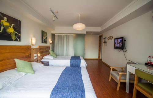 Imagen de la habitación del Hotel Sky Garden Inn. Foto 8