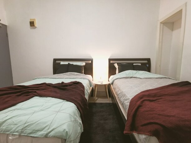 Imagen de la habitación del Hotel Sky Garden Studios. Foto 21