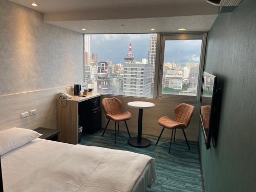 Imagen de la habitación del Hotel Sky Gate Hotel. Foto 2