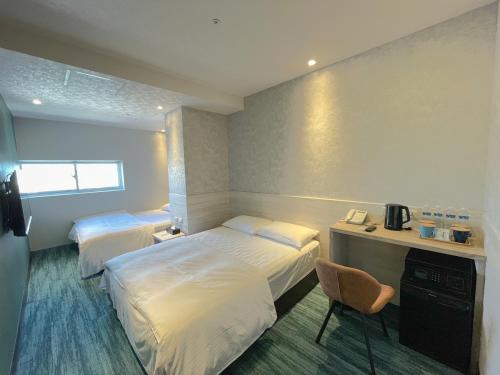Imagen de la habitación del Hotel Sky Gate Hotel. Foto 4