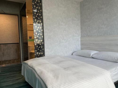 Imagen de la habitación del Hotel Sky Gate Hotel. Foto 7