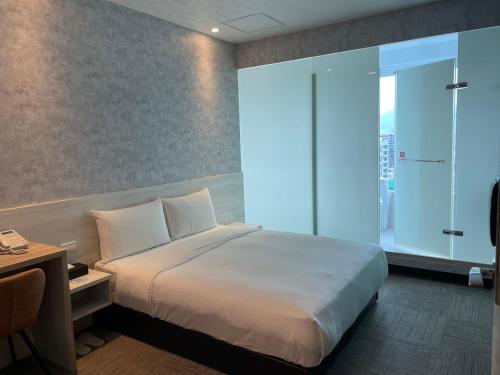 Imagen de la habitación del Hotel Sky Gate Hotel. Foto 11