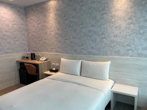 Imagen de la habitación del Hotel Sky Gate Hotel. Foto 12