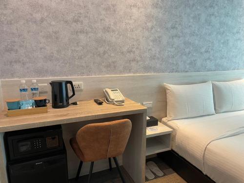 Imagen de la habitación del Hotel Sky Gate Hotel. Foto 13