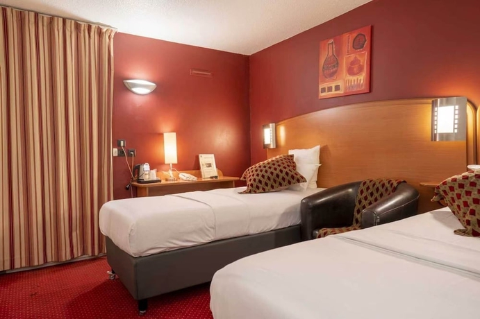 Imagen de la habitación del Hotel Sky Goussainville Charles de Gaulle. Foto 8