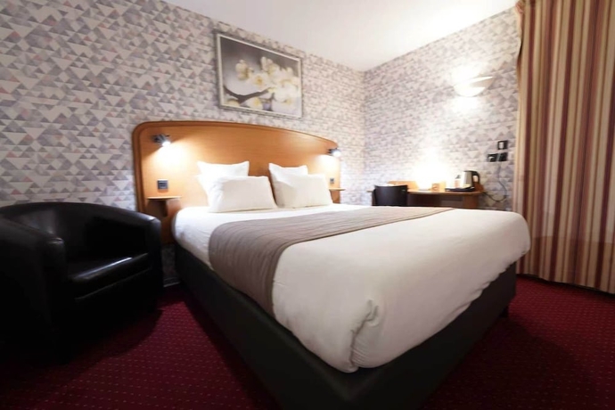Imagen de la habitación del Hotel Sky Goussainville Charles de Gaulle. Foto 10