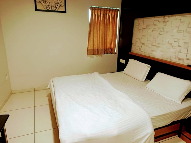 Imagen de la habitación del Hotel Sky Inn, Bhavnagar. Foto 5