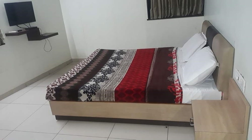 Imagen de la habitación del Hotel Sky Inn, Bhavnagar. Foto 7