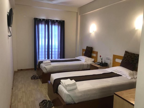 Imagen de la habitación del Hotel Sky Motel Kalaw. Foto 5