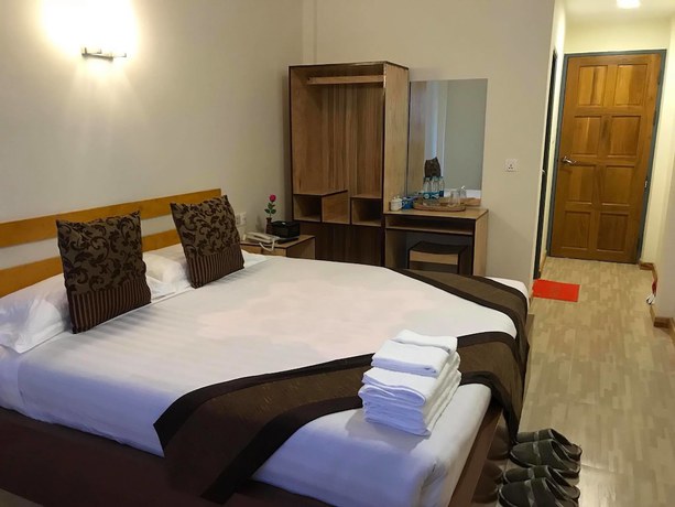 Imagen de la habitación del Hotel Sky Motel Kalaw. Foto 6