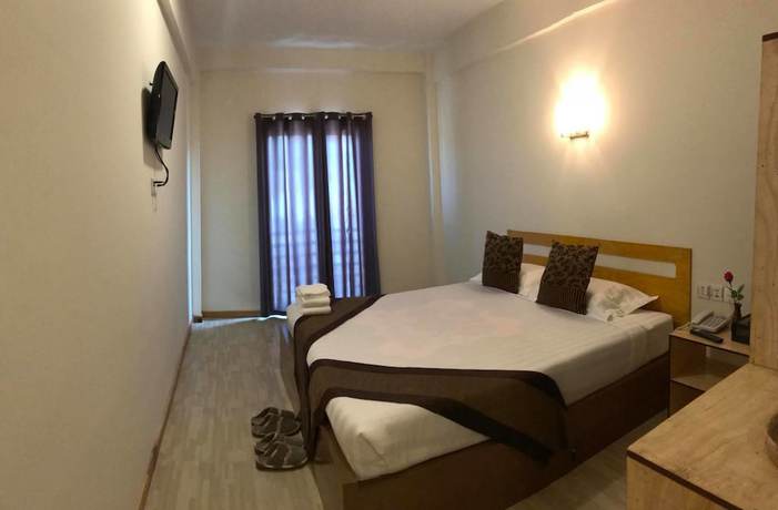 Imagen de la habitación del Hotel Sky Motel Kalaw. Foto 10