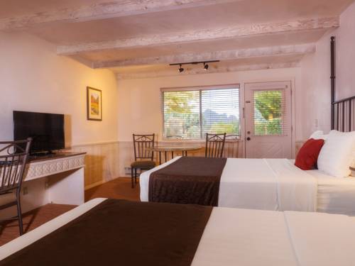 Imagen de la habitación del Hotel Sky Ranch Lodge. Foto 9