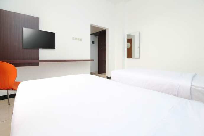 Imagen de la habitación del Hotel Sky Residence Simpang Lima 1 Semarang. Foto 16
