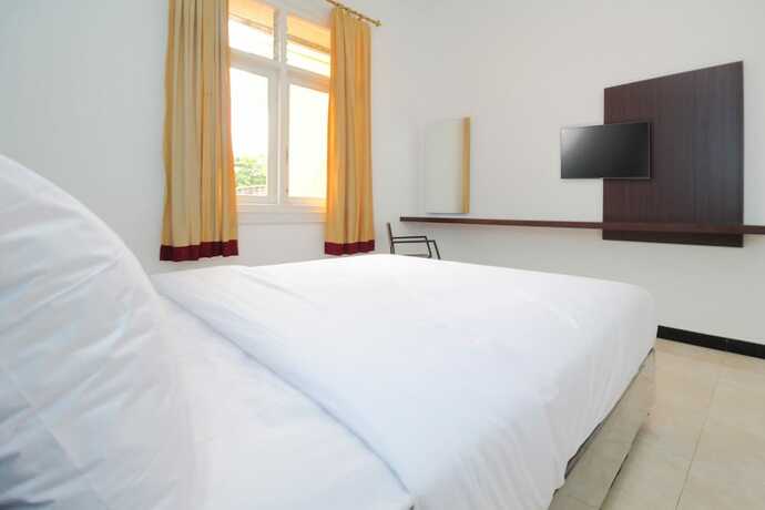 Imagen de la habitación del Hotel Sky Residence Simpang Lima 1 Semarang. Foto 17