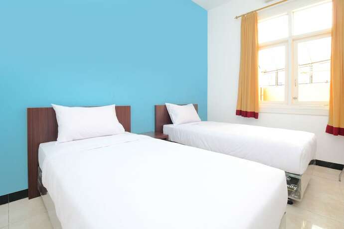 Imagen de la habitación del Hotel Sky Residence Simpang Lima 1 Semarang. Foto 18