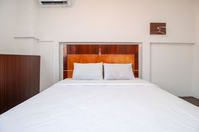 Imagen de la habitación del Hotel Sky Residence Simpang Lima 1 Semarang. Foto 27