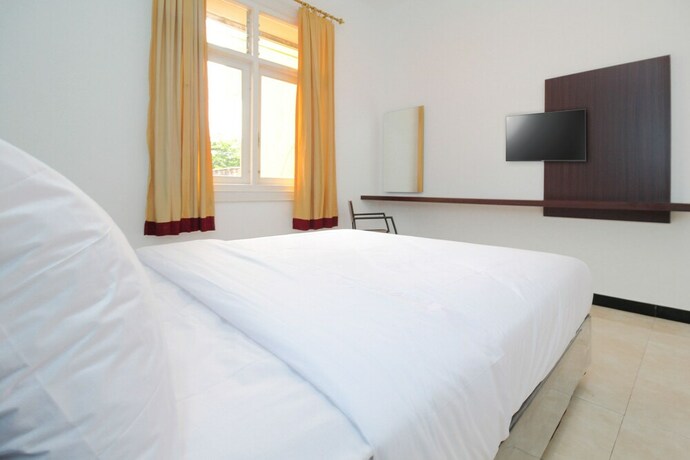 Imagen de la habitación del Hotel Sky Residence Simpang Lima 1 Semarang. Foto 29