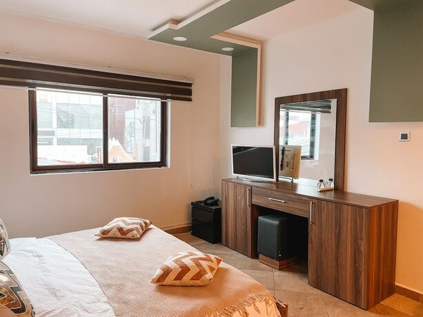 Imagen de la habitación del Hotel Sky Suites Osu. Foto 12
