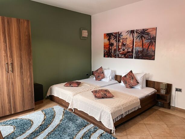 Imagen de la habitación del Hotel Sky Suites Osu. Foto 15