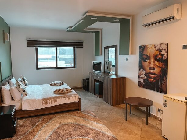 Imagen de la habitación del Hotel Sky Suites Osu. Foto 17