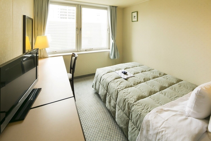 Imagen de la habitación del Hotel Sky Tower Miyazaki. Foto 2
