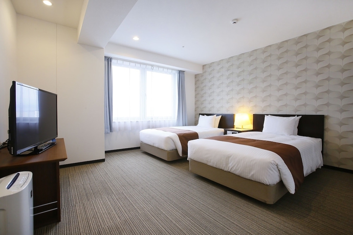 Imagen de la habitación del Hotel Sky Tower Miyazaki. Foto 4