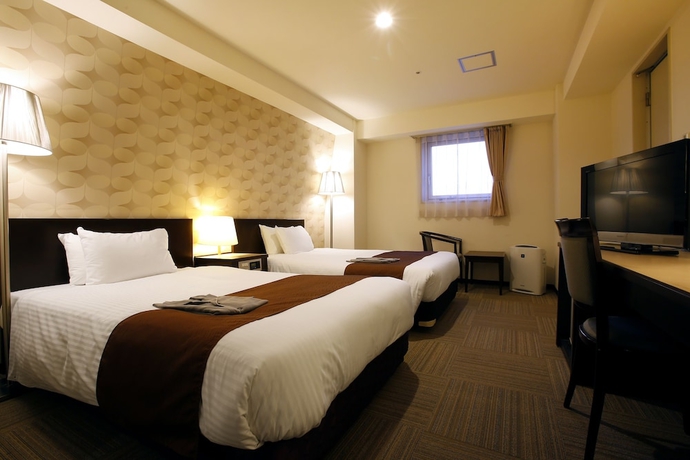 Imagen de la habitación del Hotel Sky Tower Miyazaki. Foto 5