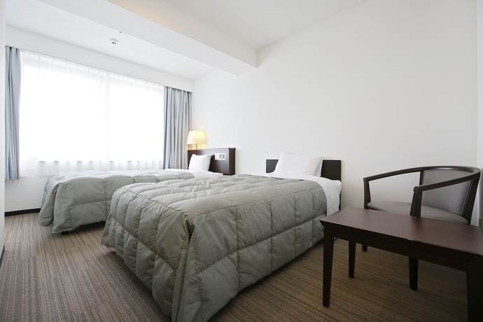 Imagen de la habitación del Hotel Sky Tower Miyazaki. Foto 9